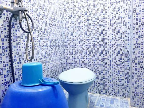 Imagen de la habitación del Hotel Trivadoh Syariah. Foto 10