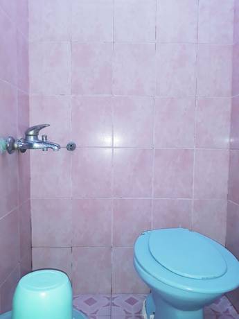 Imagen de la habitación del Hotel Trivadoh Syariah. Foto 12