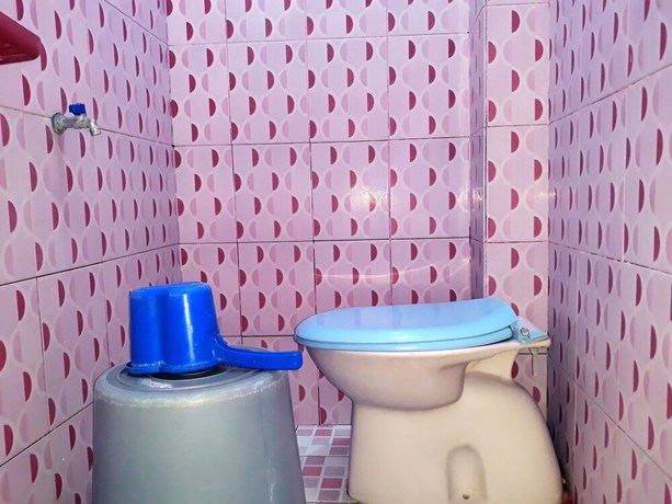 Imagen de la habitación del Hotel Trivadoh Syariah. Foto 13