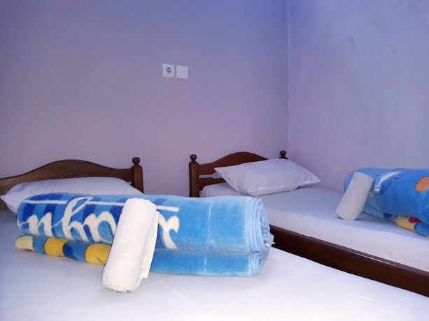 Imagen de la habitación del Hotel Trivadoh Syariah. Foto 14