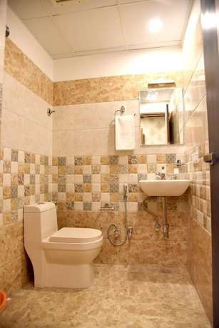 Imagen de la habitación del Hotel Triveni Residency. Foto 4