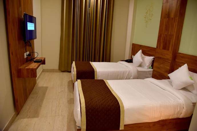 Imagen de la habitación del Hotel Triveni Residency. Foto 7