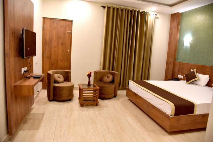 Imagen de la habitación del Hotel Triveni Residency. Foto 8