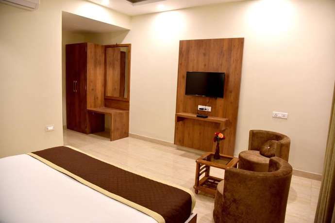 Imagen de la habitación del Hotel Triveni Residency. Foto 11