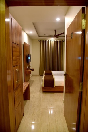 Imagen de la habitación del Hotel Triveni Residency. Foto 13