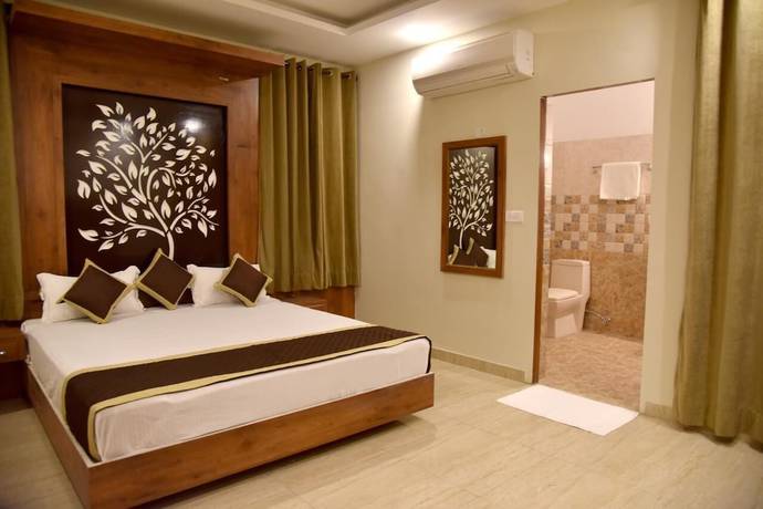 Imagen de la habitación del Hotel Triveni Residency. Foto 17