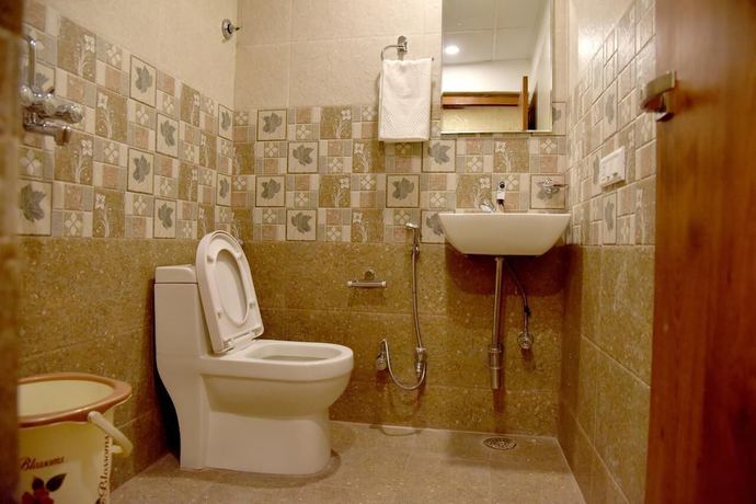 Imagen de la habitación del Hotel Triveni Residency. Foto 18