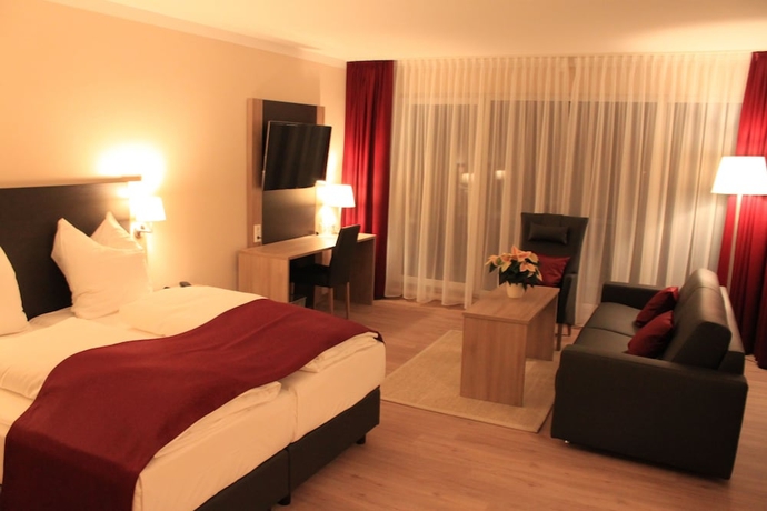 Imagen de la habitación del Hotel Troll's Brauhaus. Foto 4