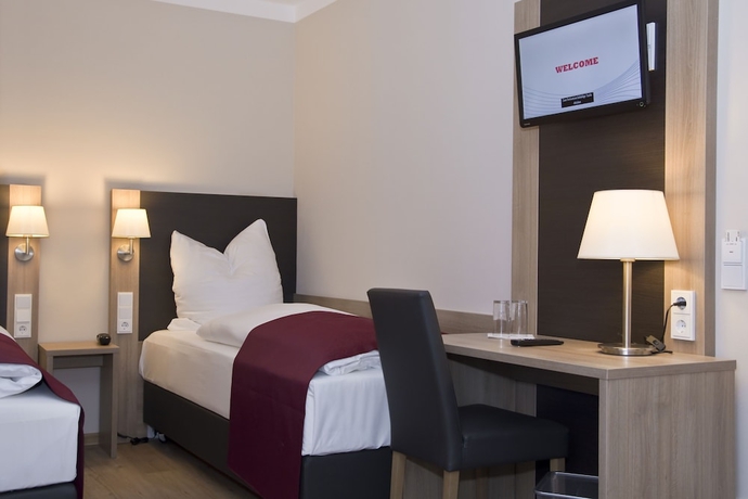 Imagen de la habitación del Hotel Troll's Brauhaus. Foto 9