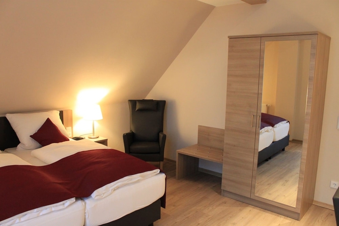 Imagen de la habitación del Hotel Troll's Brauhaus. Foto 17