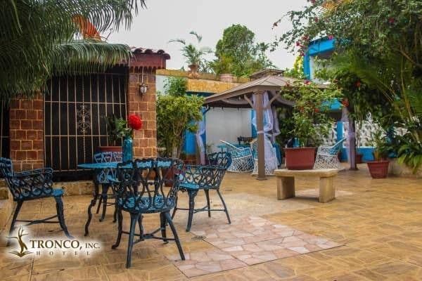 Imagen de los exteriores del Hotel Tronco Inc. Foto 10