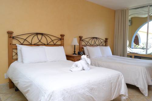 Imagen de la habitación del Hotel Tropi Rock. Foto 7