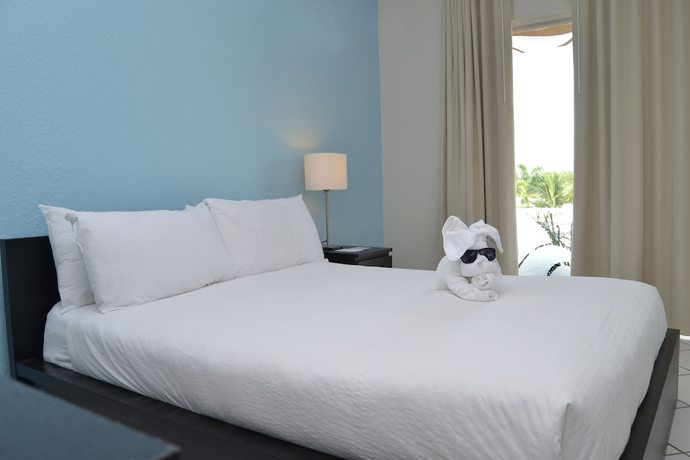 Imagen de la habitación del Hotel TropiRock A North Beach Village Resort. Foto 7