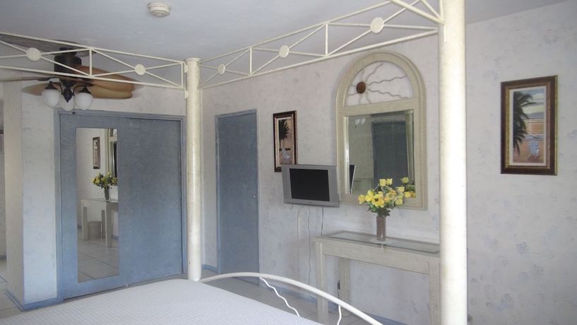 Imagen de la habitación del Hotel TropiRock A North Beach Village Resort. Foto 11