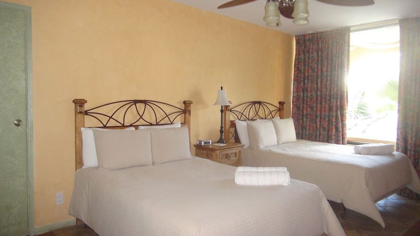 Imagen de la habitación del Hotel TropiRock A North Beach Village Resort. Foto 12