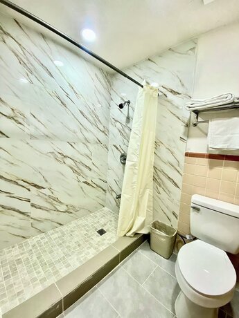 Imagen de la habitación del Hotel Tropic Motel. Foto 19