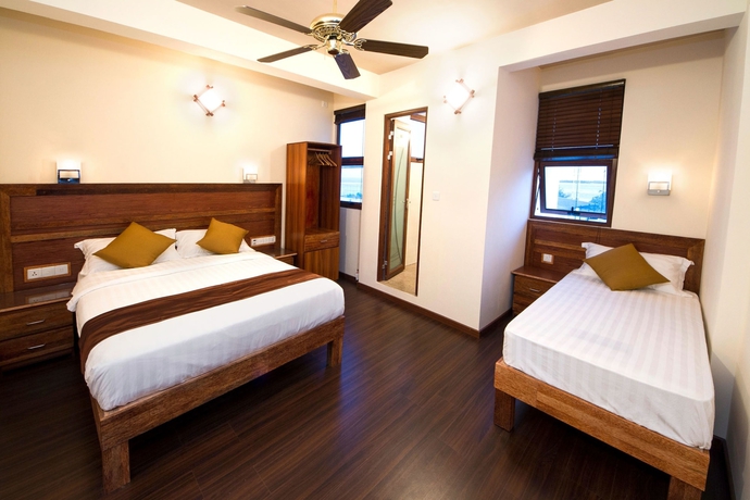 Imagen de la habitación del Hotel Tropic Tree Maldives. Foto 5