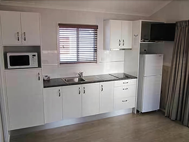 Imagen de la habitación del Hotel Tropical Beach Caravan Park. Foto 10