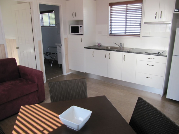 Imagen de la habitación del Hotel Tropical Beach Caravan Park. Foto 11