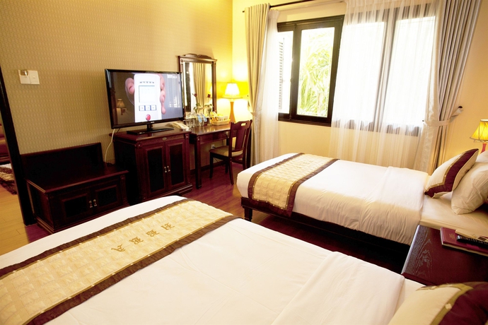Imagen de la habitación del Hotel Tropical Beach Hoi An Resort. Foto 10