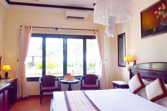 Imagen de la habitación del Hotel Tropical Beach Hoi An Resort. Foto 11