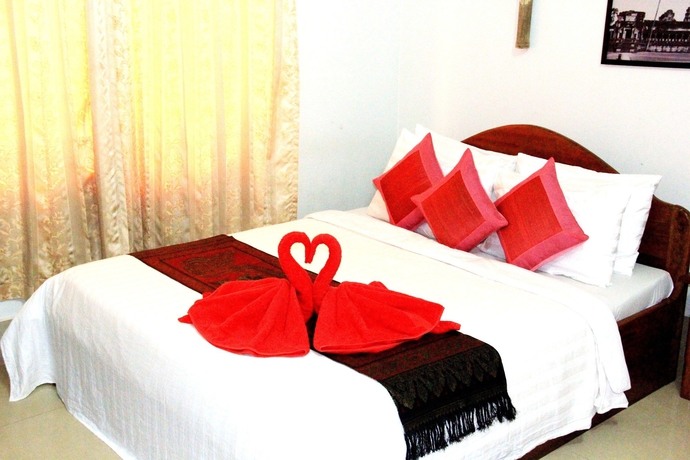 Imagen de la habitación del Hotel Tropical Breeze Guesthouse. Foto 1