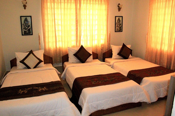 Imagen de la habitación del Hotel Tropical Breeze Guesthouse. Foto 3