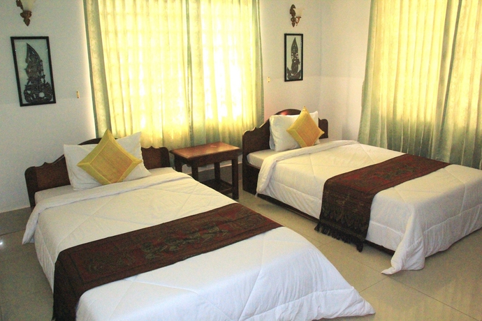 Imagen de la habitación del Hotel Tropical Breeze Guesthouse. Foto 4