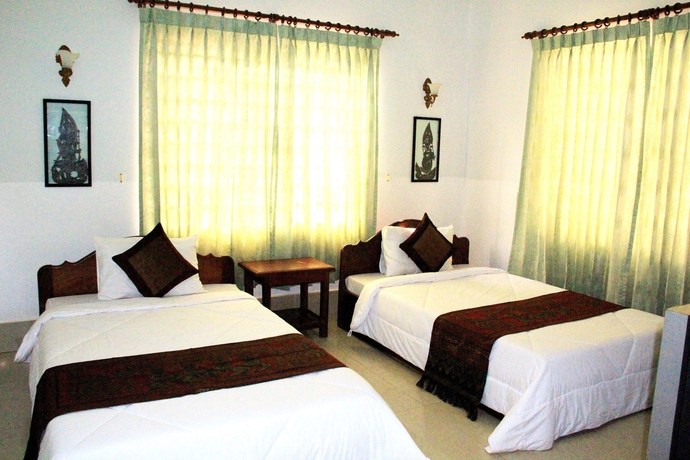 Imagen de la habitación del Hotel Tropical Breeze Guesthouse. Foto 5