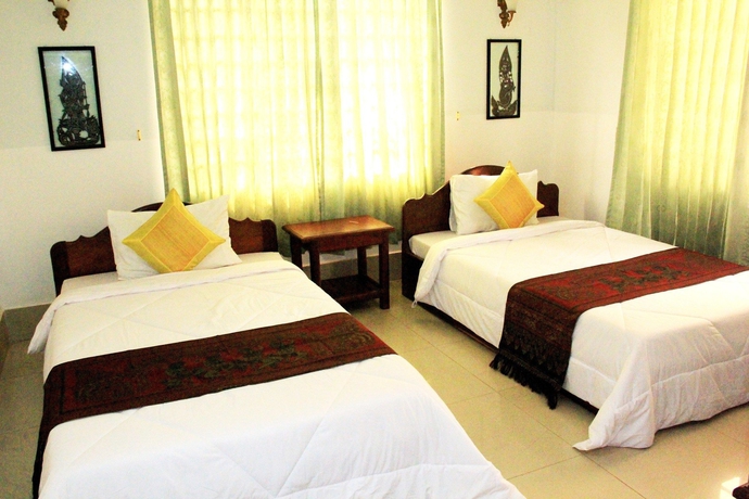 Imagen de la habitación del Hotel Tropical Breeze Guesthouse. Foto 6