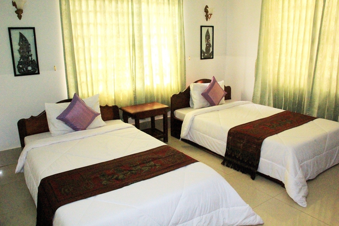 Imagen de la habitación del Hotel Tropical Breeze Guesthouse. Foto 7