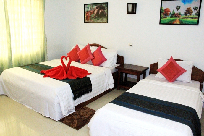 Imagen de la habitación del Hotel Tropical Breeze Guesthouse. Foto 8