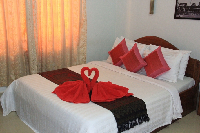 Imagen de la habitación del Hotel Tropical Breeze Guesthouse. Foto 9