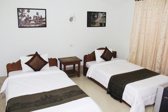 Imagen de la habitación del Hotel Tropical Breeze Guesthouse. Foto 11