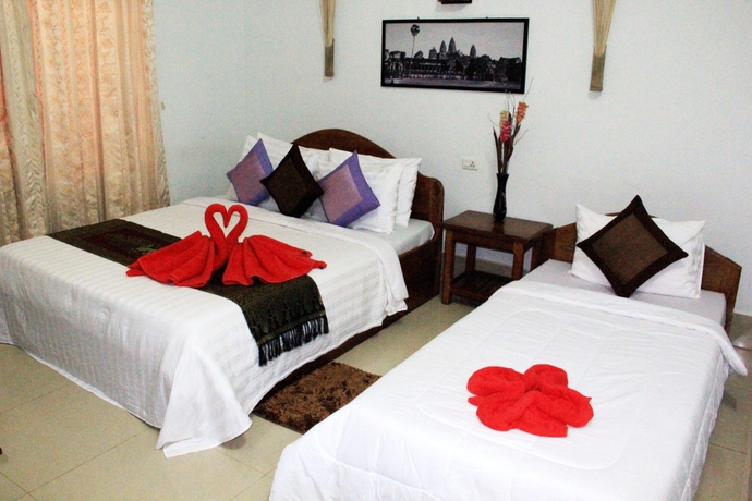 Imagen de la habitación del Hotel Tropical Breeze Guesthouse. Foto 12