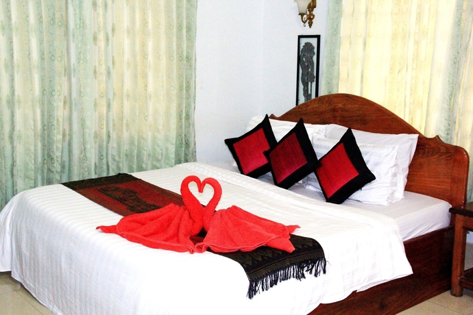 Imagen de la habitación del Hotel Tropical Breeze Guesthouse. Foto 13