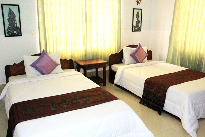 Imagen de la habitación del Hotel Tropical Breeze Guesthouse. Foto 14