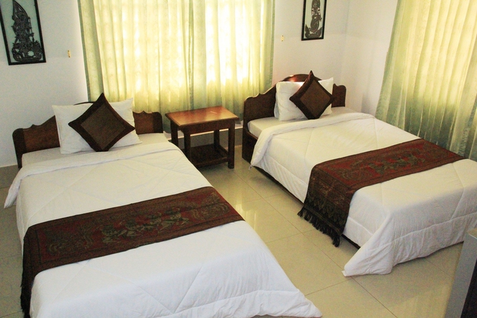 Imagen de la habitación del Hotel Tropical Breeze Guesthouse. Foto 15