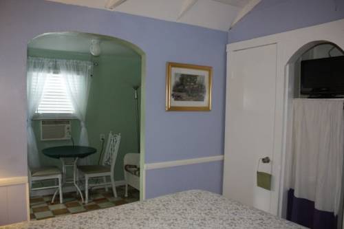 Imagen de la habitación del Hotel Tropical Cottages. Foto 2