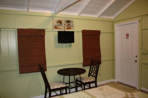 Imagen de la habitación del Hotel Tropical Cottages. Foto 4