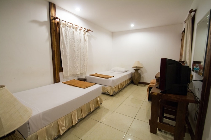 Imagen de la habitación del Hotel Tropical Garden Bungalow. Foto 4