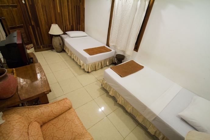 Imagen de la habitación del Hotel Tropical Garden Bungalow. Foto 5