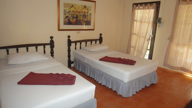Imagen de la habitación del Hotel Tropical Garden Bungalow. Foto 6