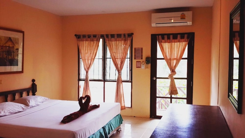 Imagen de la habitación del Hotel Tropical Garden Bungalow. Foto 7