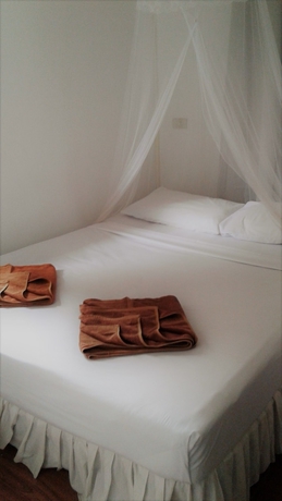 Imagen de la habitación del Hotel Tropical Garden Bungalow. Foto 9