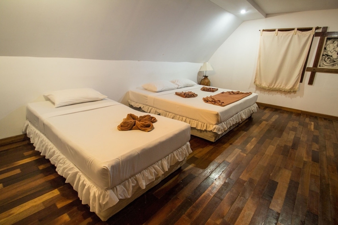 Imagen de la habitación del Hotel Tropical Garden Bungalow. Foto 10