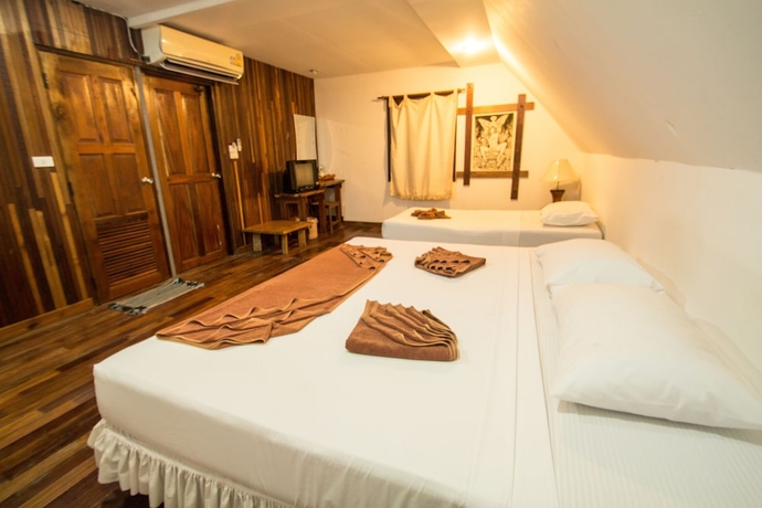 Imagen de la habitación del Hotel Tropical Garden Bungalow. Foto 11
