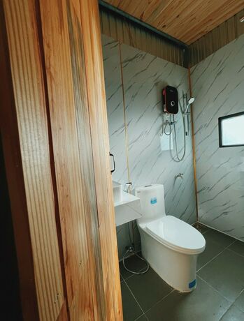 Imagen de la habitación del Hotel Tropical Garden Homestay. Foto 13