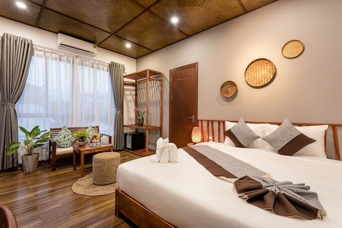 Imagen de la habitación del Hotel Tropical Home Villa. Foto 19