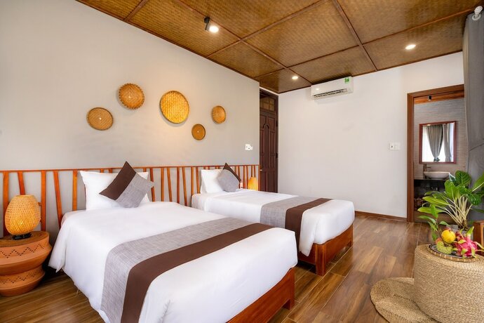 Imagen de la habitación del Hotel Tropical Home Villa. Foto 29